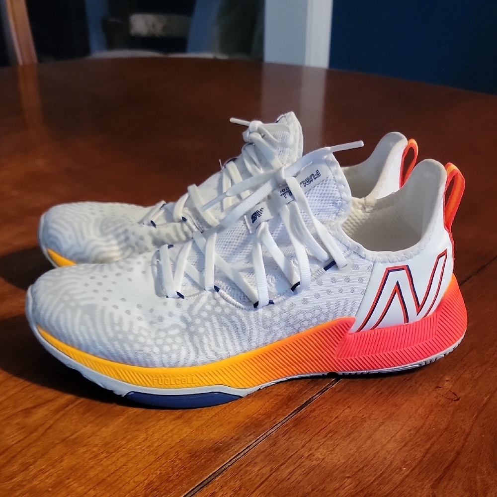 New Balance White and Orange Athletic Shoes